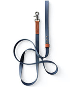 Waterproof Navy dog lead bound in brown Veg tan genuine Italian leather.
