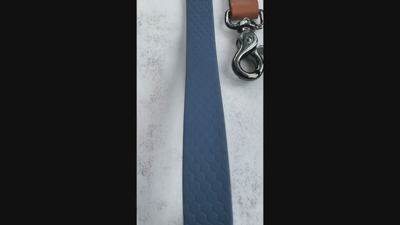 Waterproof Navy dog lead bound in brown Veg tan genuine Italian leather.